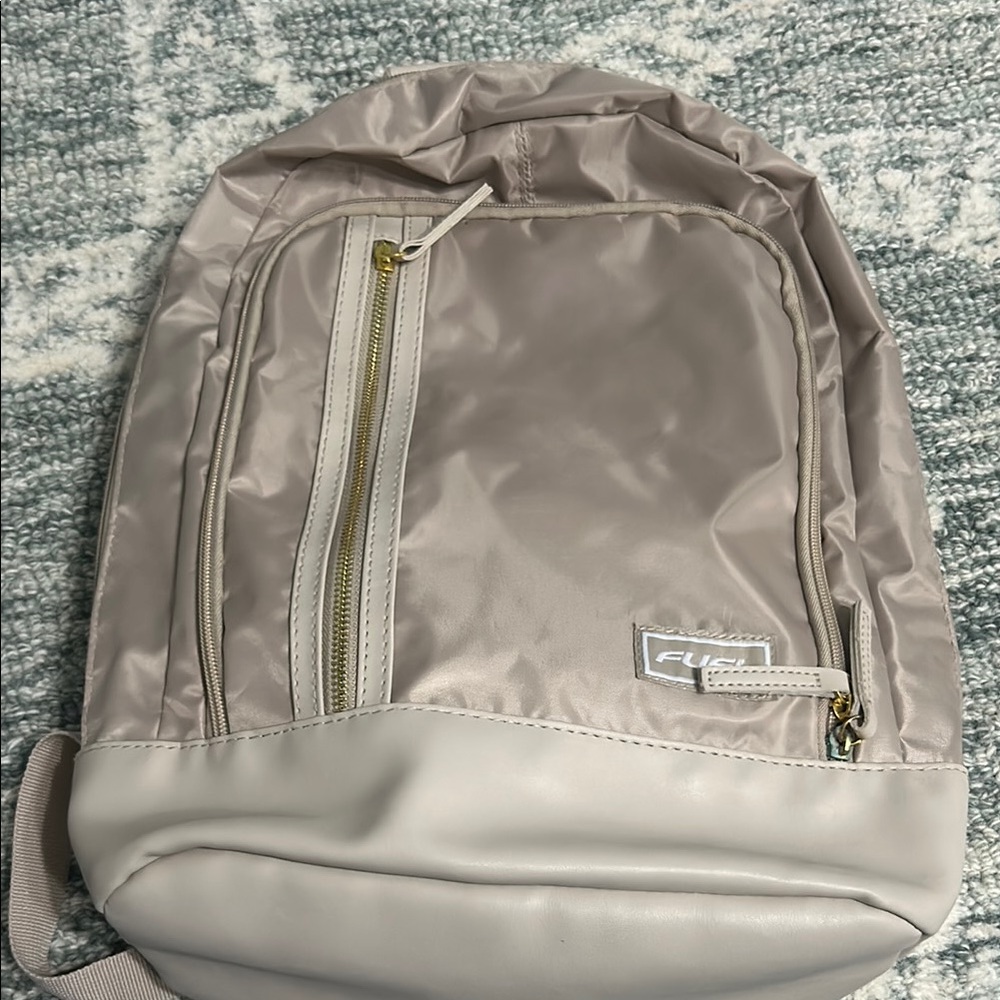 Tan Backpack with Modern Design and Minimalist Aesthetic